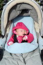 In her pushchair