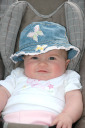in her new sun hat